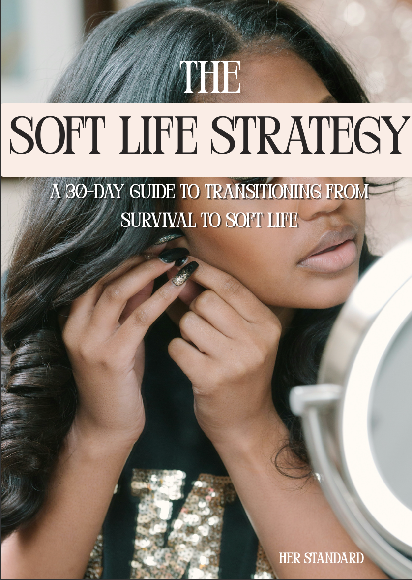 Book cover of 'The Soft Life Strategy' with a person adjusting their hair.
